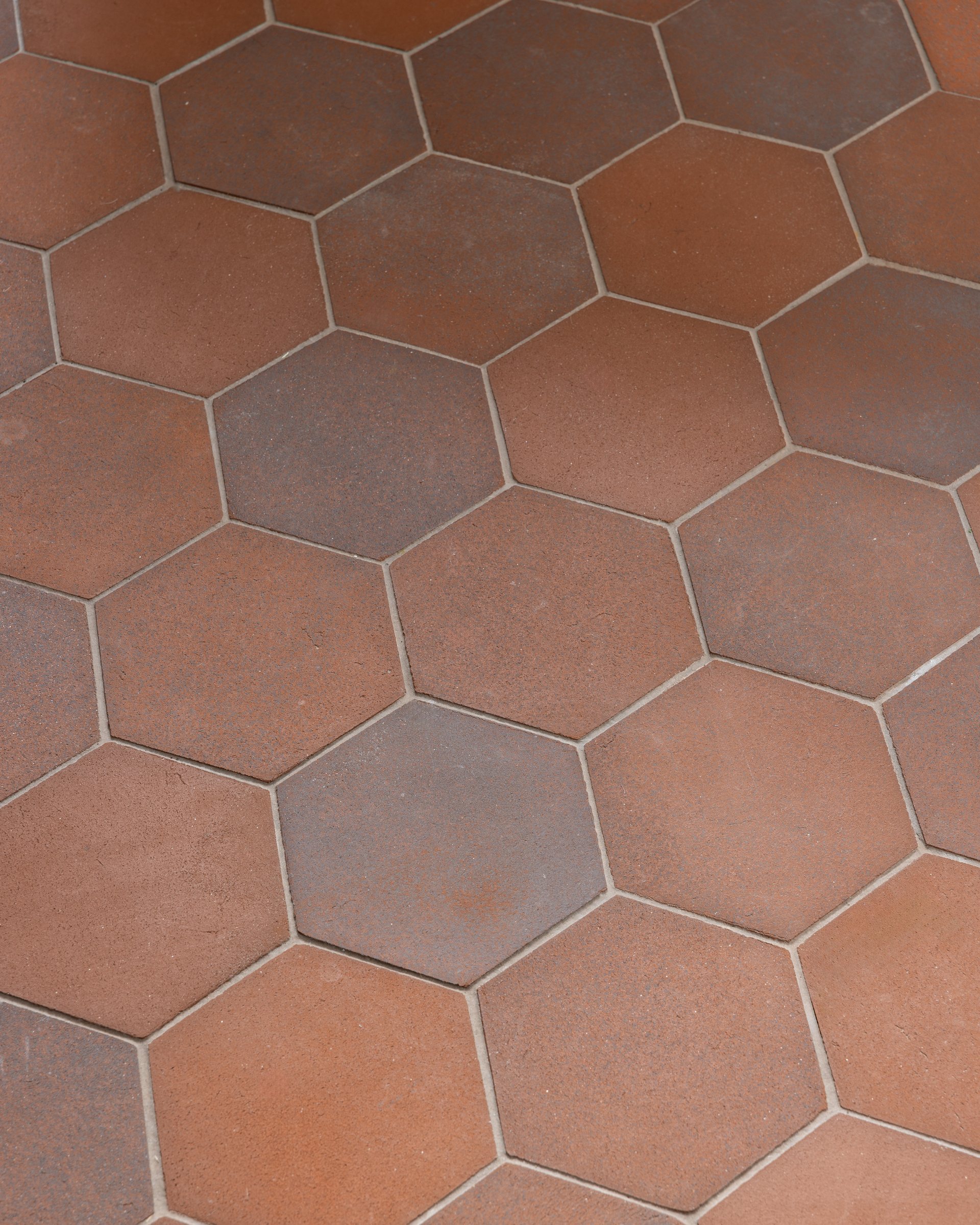 Terracotta hex-tile detail, built by Mosher Dolan