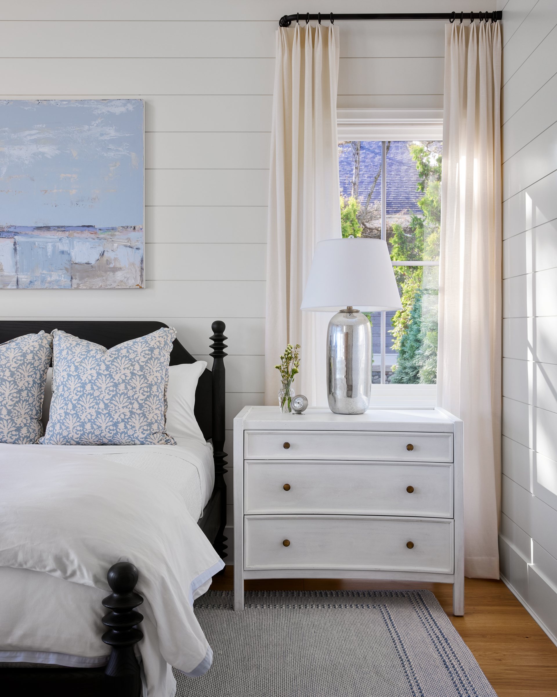 Primary bedroom with waterfront light
