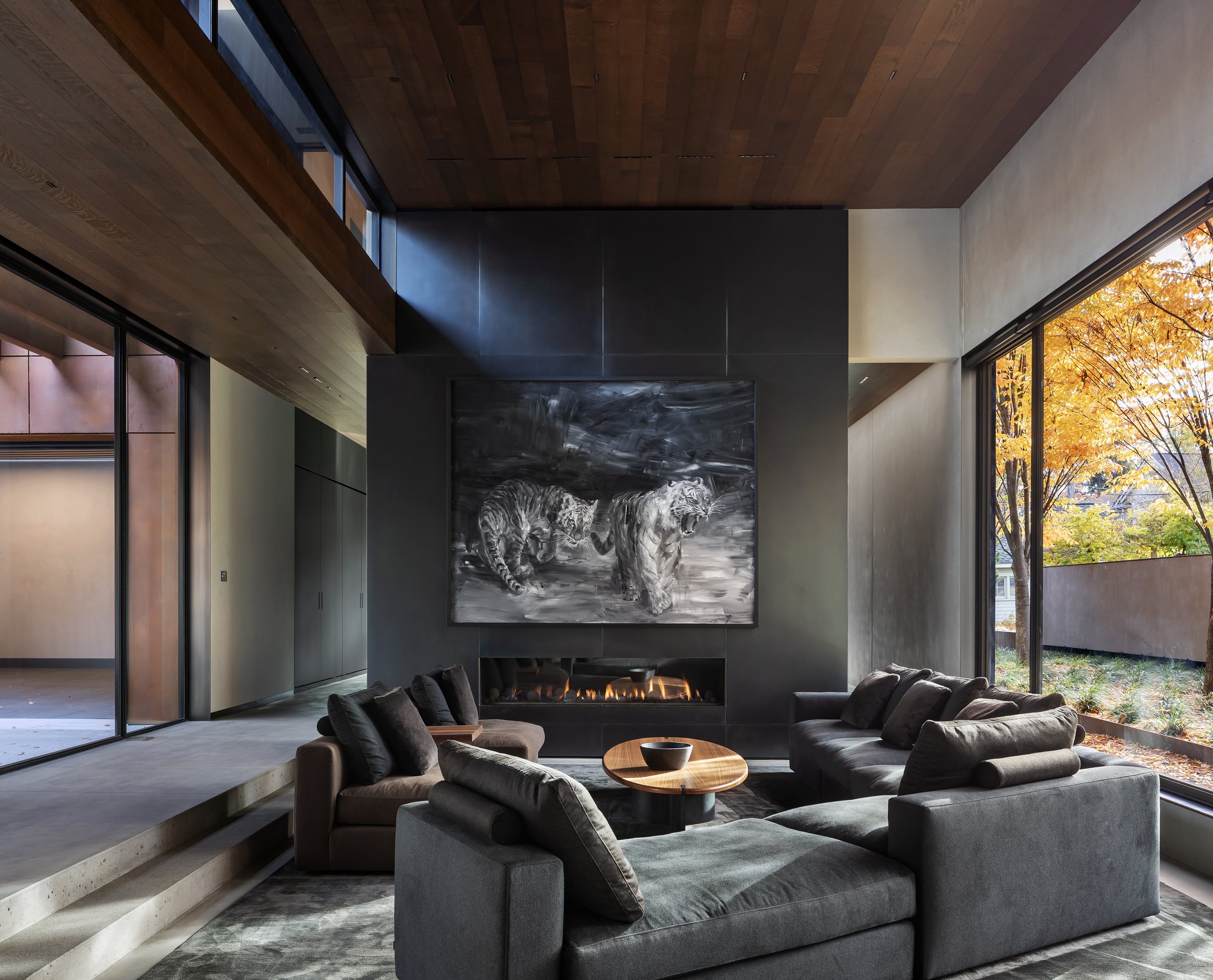 Family room with a linear fireplace, built by Mosher Dolan