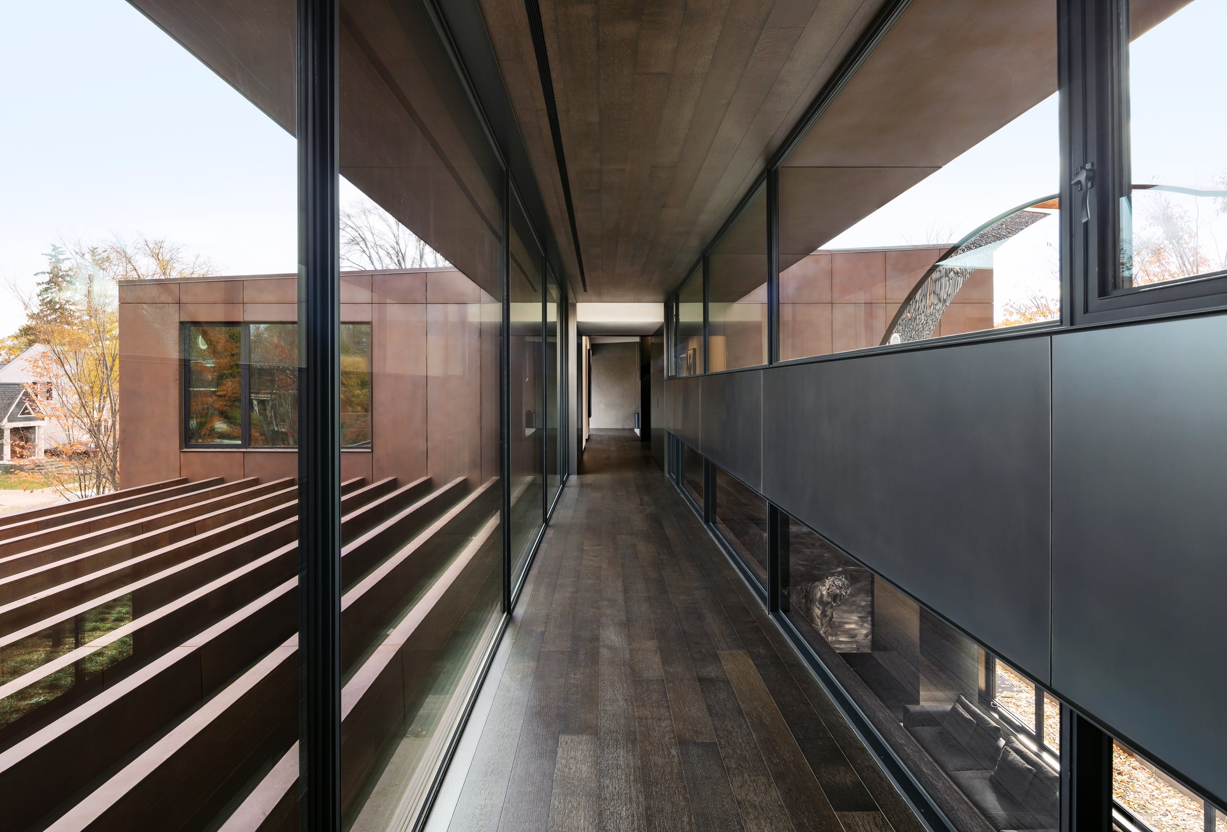 Glass-walled hallway, built by Mosher Dolan