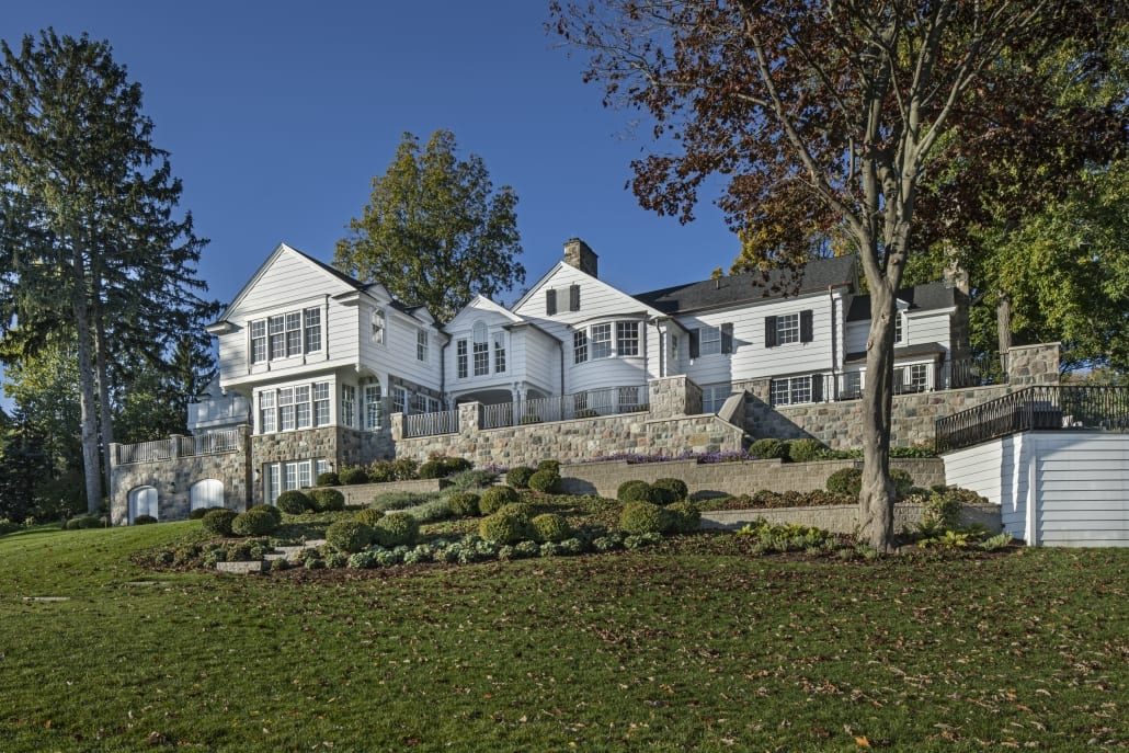 The lake side of the Historic Lake Retreat, with the addition reading as part of the original house