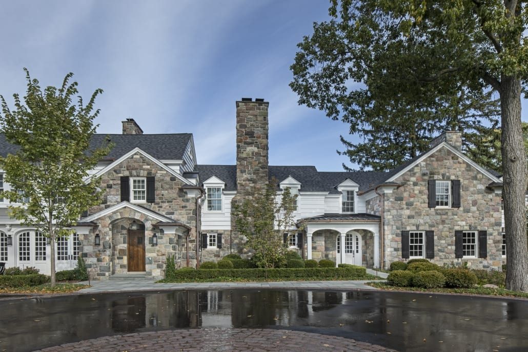 Stone entry court and reflecting pool at the Historic Lake Retreat