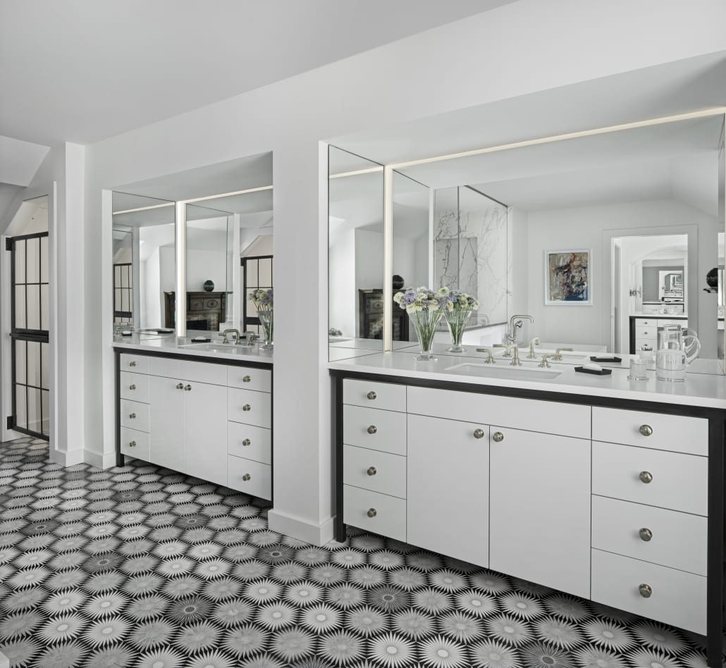 Double vanity with a hexagonal tile floor