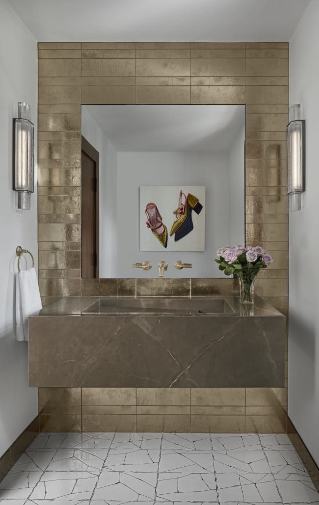 Stone-clad shower wall with a niche